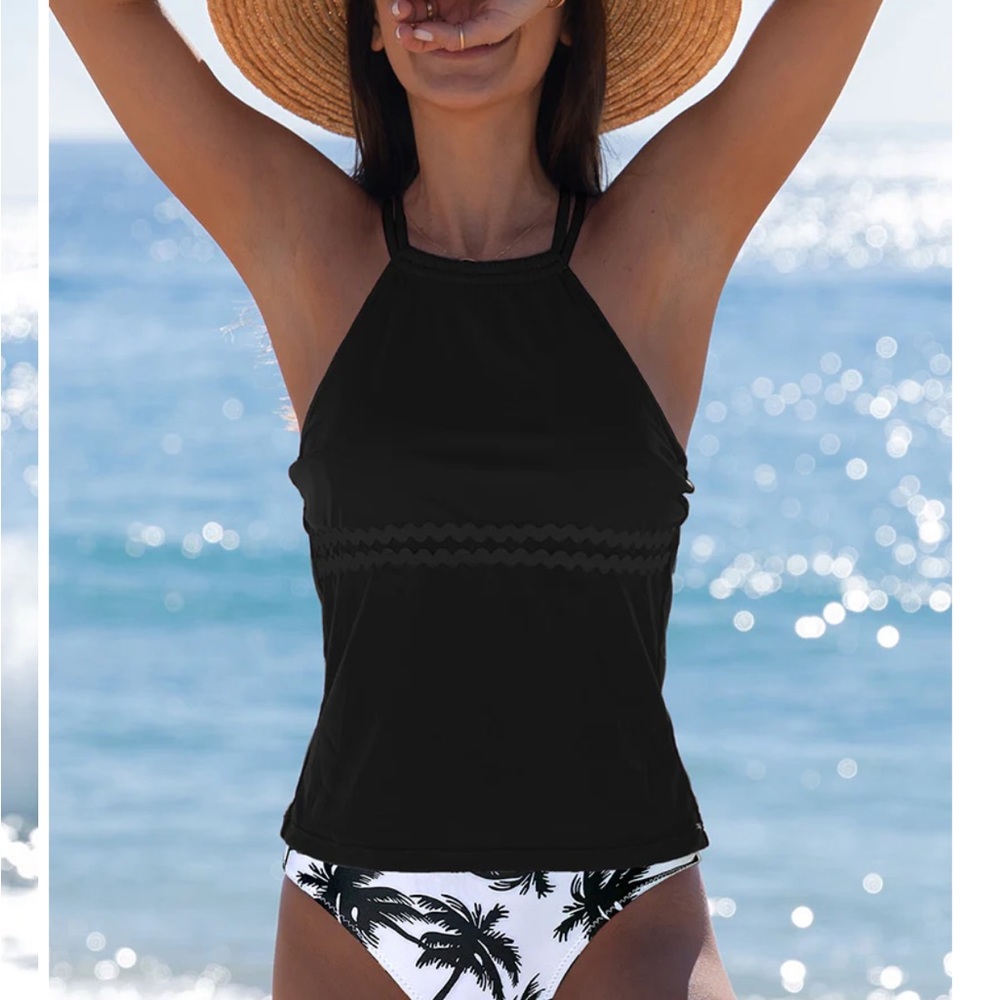 Beachissi tankini. Black top with lace band, black and white bottom. Never worn